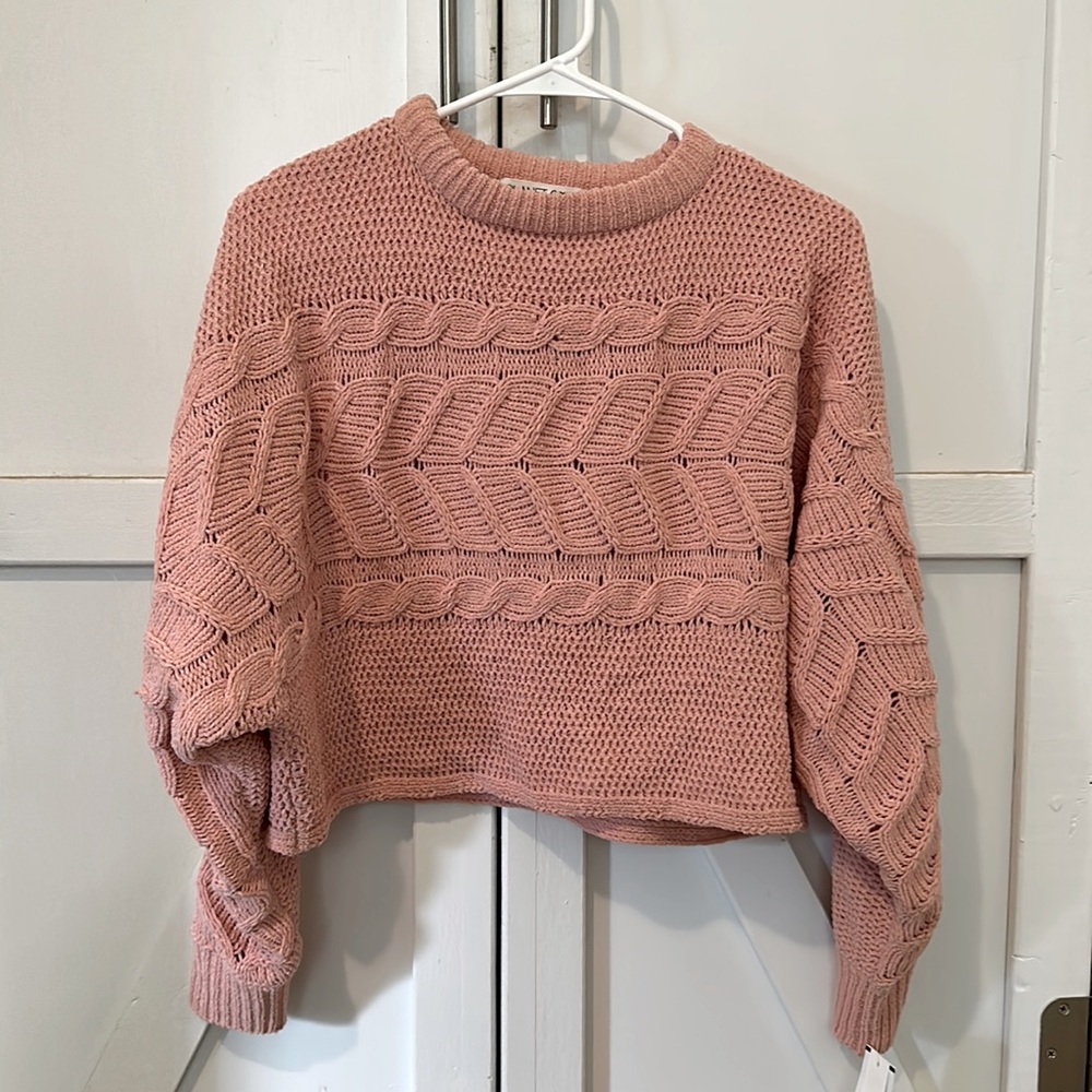 Pink cable knit sweater